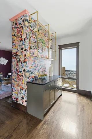 a bathroom with a toilet and shower