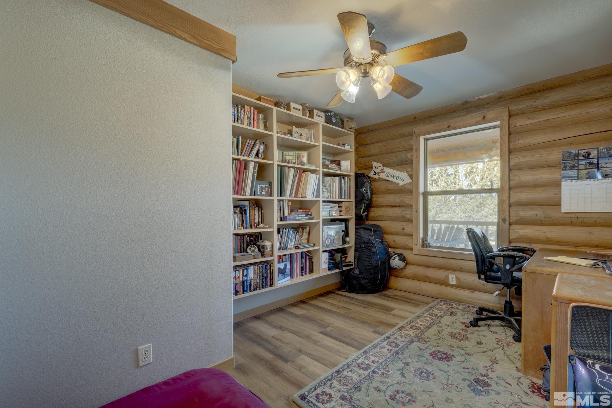2740 Goldfield Road Reno, NV 89521 - Photo 29 of 39 a view of a livingroom with workspace and a window