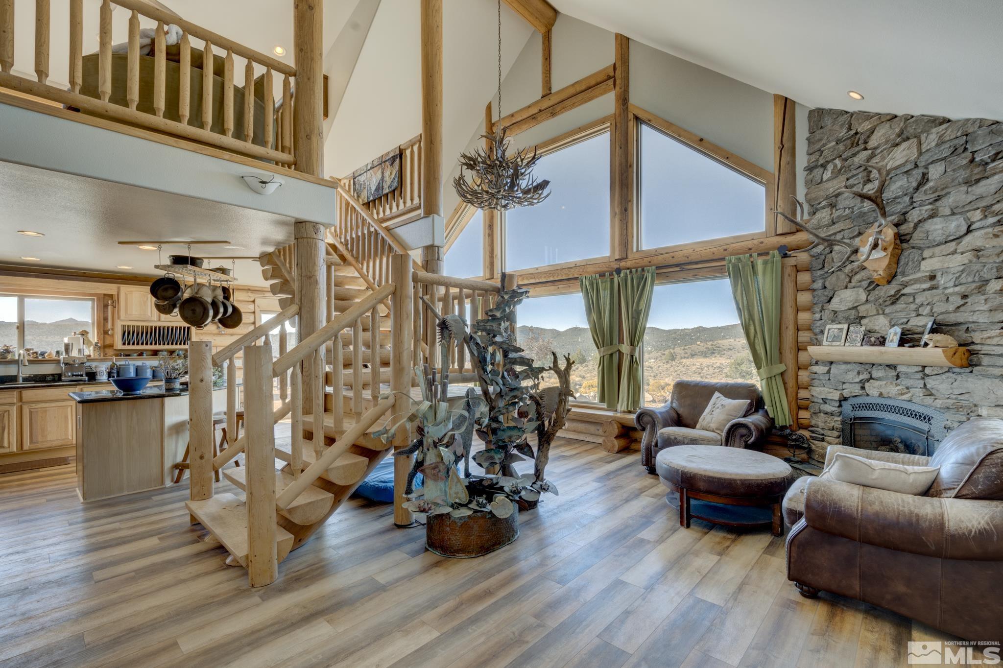 2740 Goldfield Road Reno, NV 89521 - Photo 9 of 39 a view of a livingroom with furniture and a floor to ceiling window