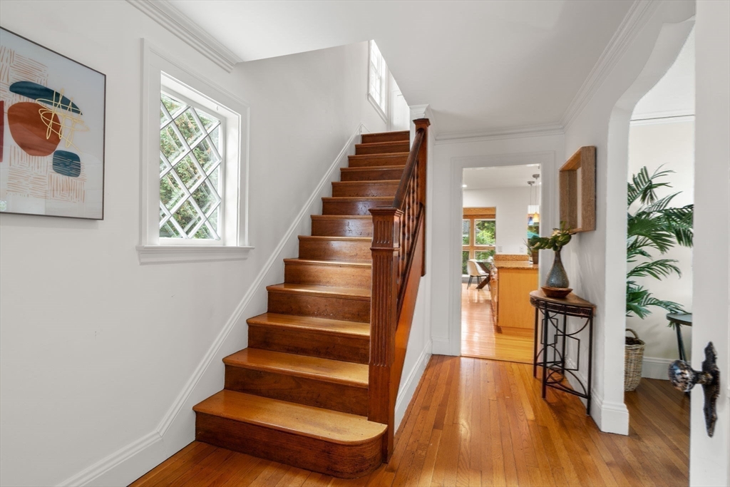 151 Woodcliff Road Newton, MA 02461 - Photo 21 of 33 a view of entryway and hall with wooden floor