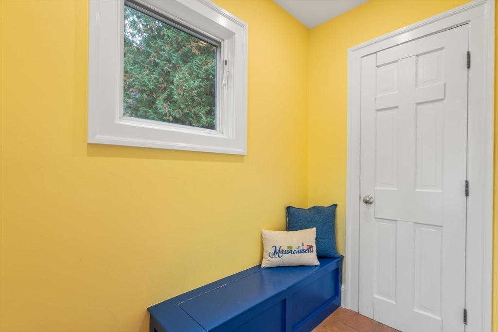 151 Woodcliff Road Newton, MA 02461 - Photo 23 of 33 a view of a room with wooden floor and furniture