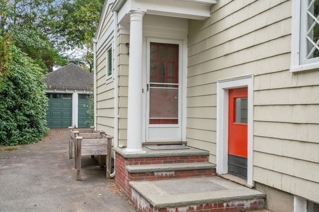 151 Woodcliff Road Newton, MA 02461 - Photo 26 of 33 a backyard of a house with seating space