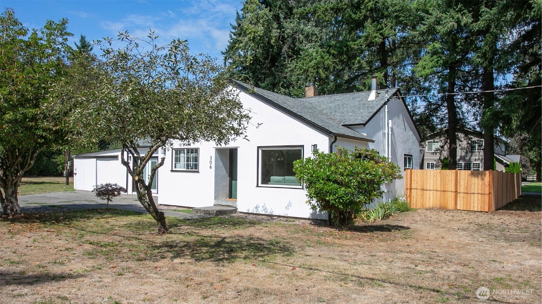 306 West Pole Road Lynden, WA 98264 - Photo 1 of 25 a view of a house with backyard and a tree