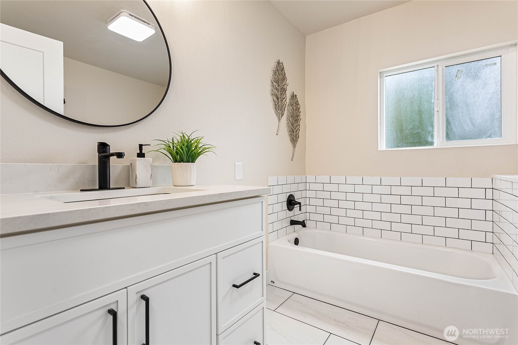 306 West Pole Road Lynden, WA 98264 - Photo 15 of 25 a bathroom with a sink and a bathtub
