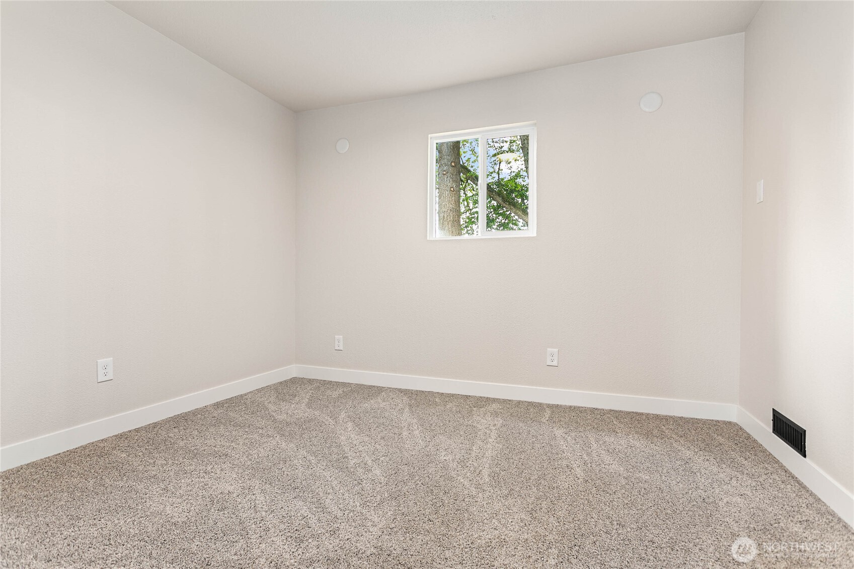 306 West Pole Road Lynden, WA 98264 - Photo 17 of 25 an empty room with a window