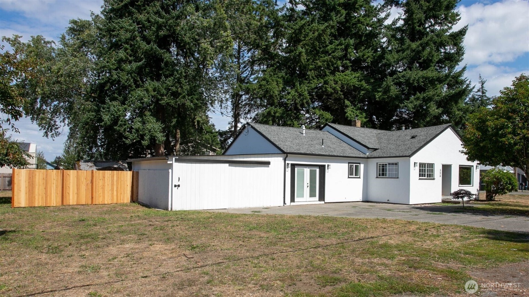 306 West Pole Road Lynden, WA 98264 - Photo 2 of 25 a house that has a tree in front of it