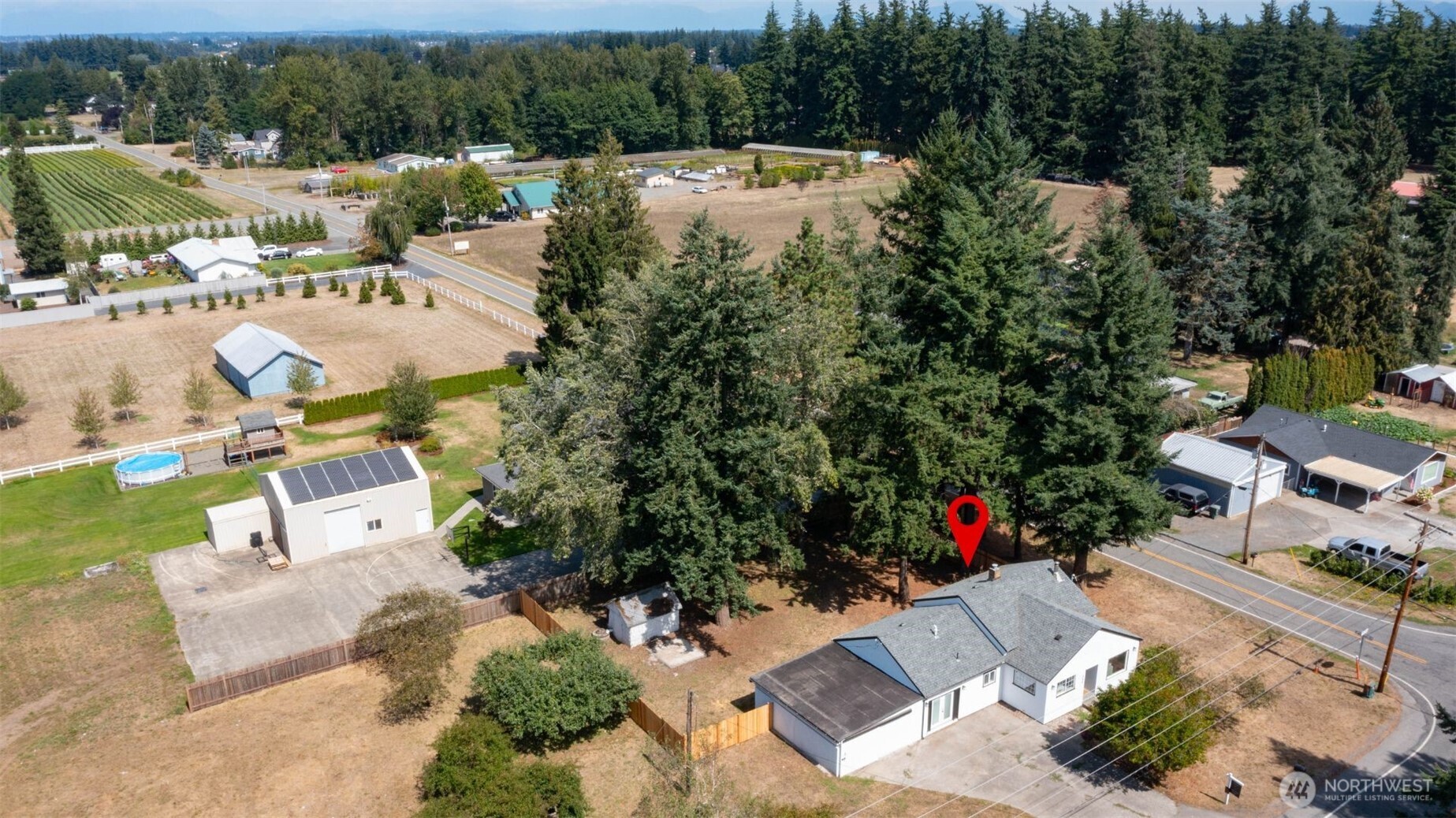 306 West Pole Road Lynden, WA 98264 - Photo 23 of 25 an aerial view of a house with garden space and lake view