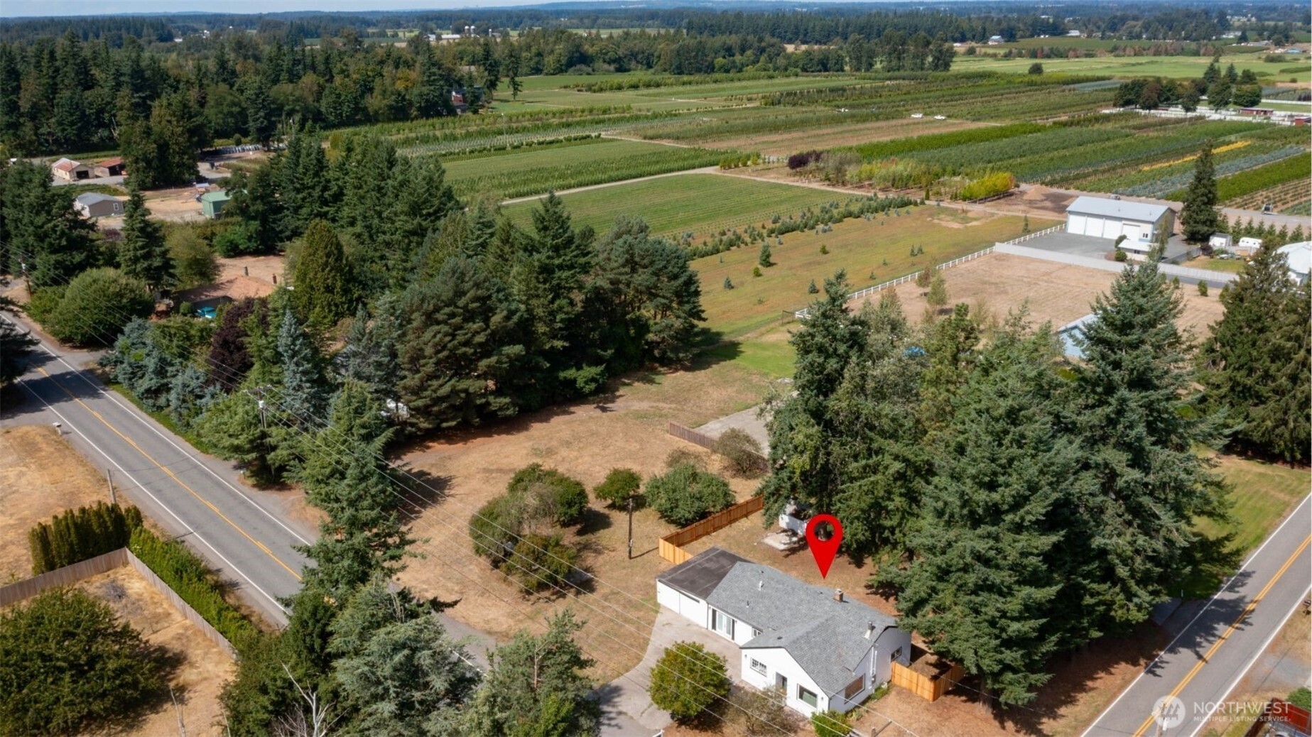 306 West Pole Road Lynden, WA 98264 - Photo 24 of 25 an aerial view of a houses with outdoor space and lake view