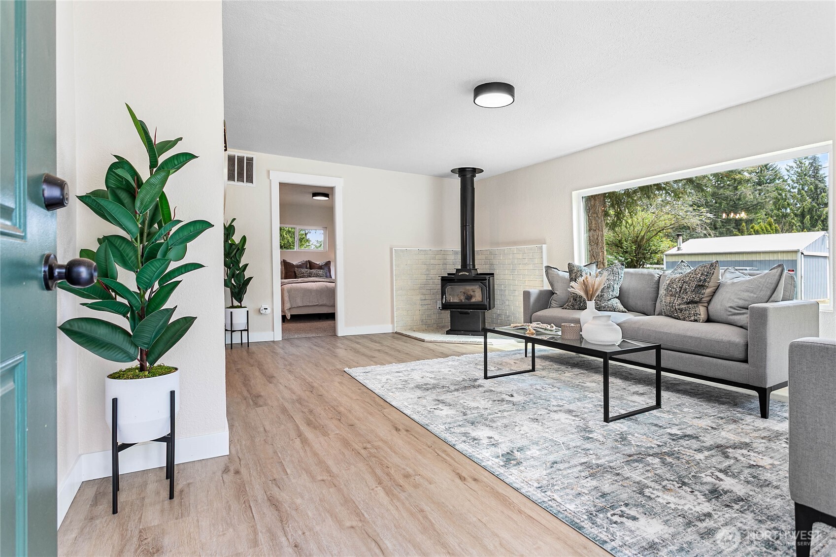 306 West Pole Road Lynden, WA 98264 - Photo 3 of 25 a living room with furniture and a potted plant