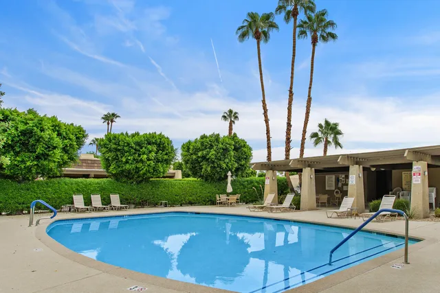 a view of outdoor space yard swimming pool and furniture