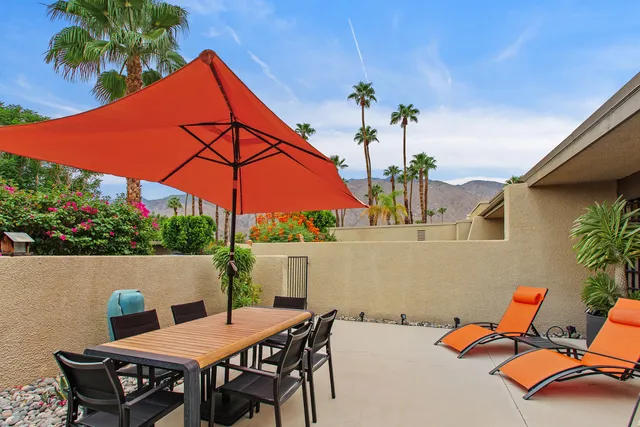 an outdoor space with furniture