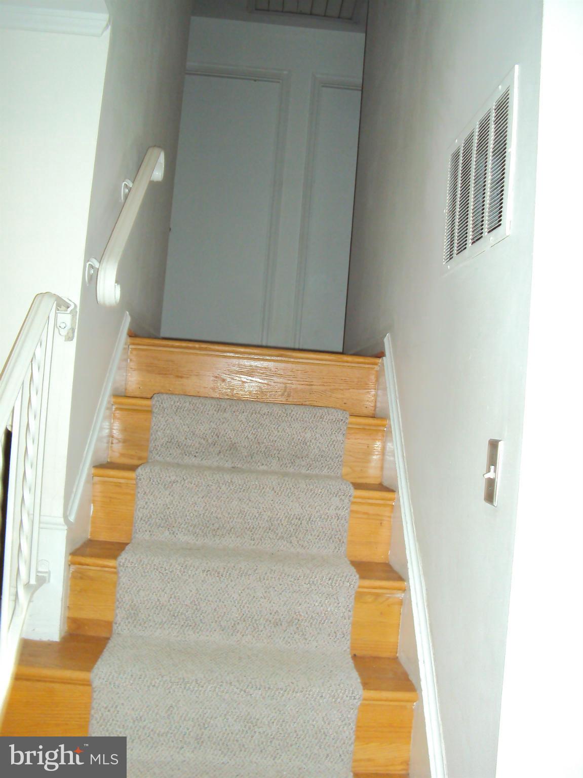9322 Winbourne Road Burke, VA 22015 - Photo 14 of 24 Stairs to upper level