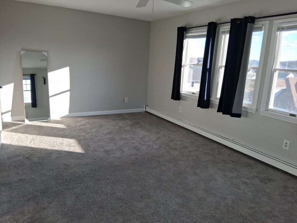 23 Gunrock Avenue Hull, MA 02045 - Photo 15 of 30 an empty room with windows