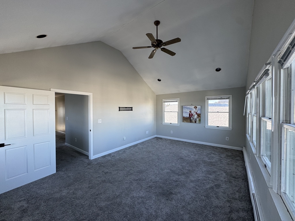 23 Gunrock Avenue Hull, MA 02045 - Photo 19 of 30 a view of empty room with window and ceiling fan