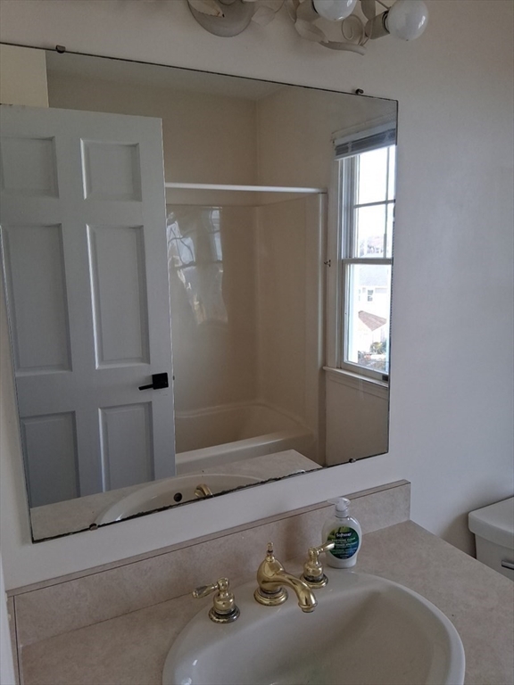 23 Gunrock Avenue Hull, MA 02045 - Photo 23 of 30 a bathroom with a tub and shower