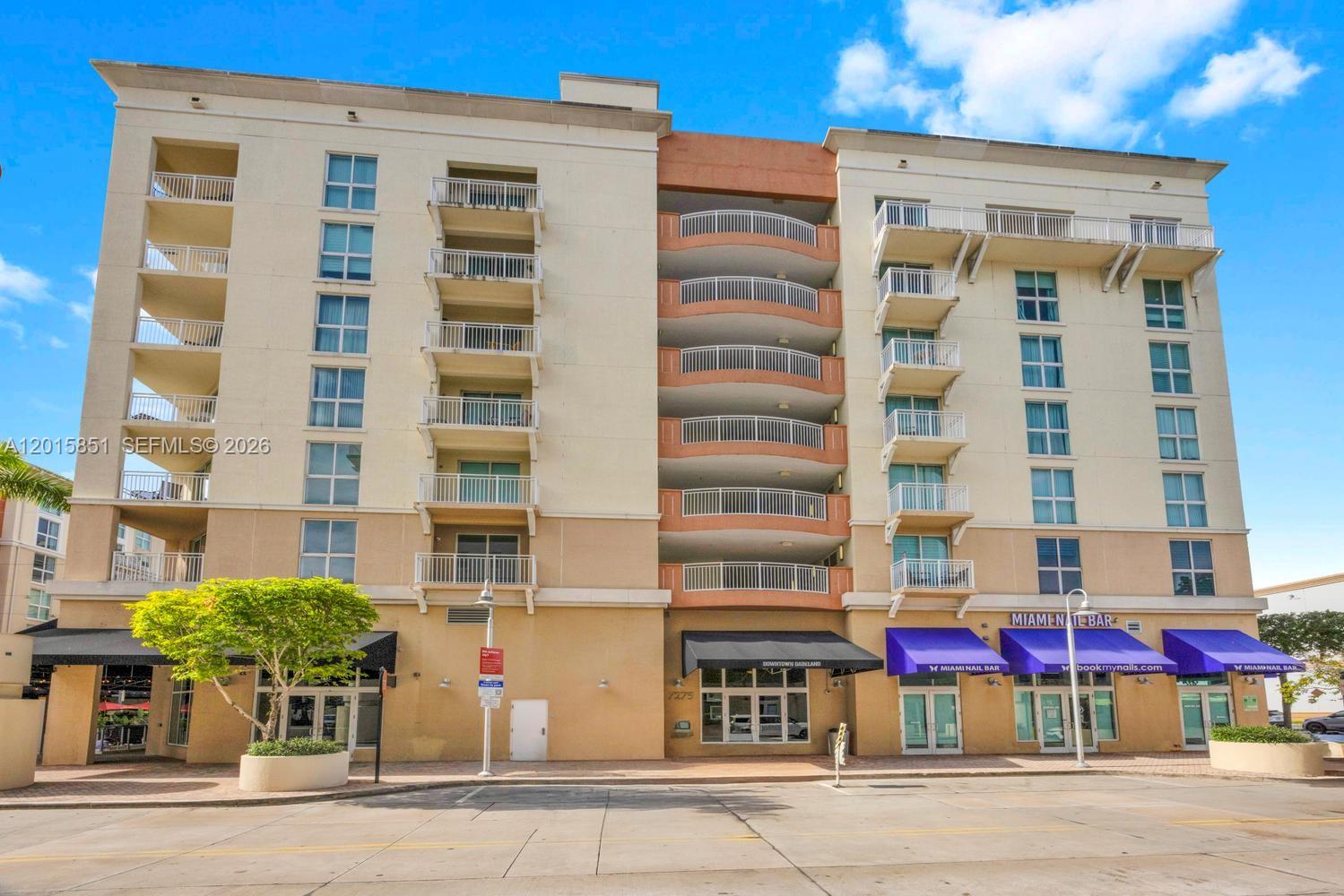 7275 Southwest 90th Street, Unit C719 Miami, FL 33156 - Photo 2 of 25 front view of a building