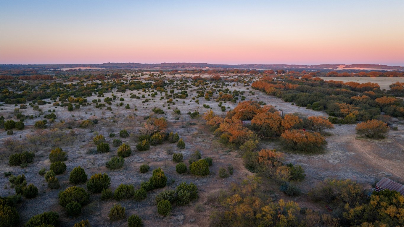 532 County Road 468 Rochelle, TX 76872 - Photo 23 of 39 Aerial view at dusk of a rural view and view of desert landscape