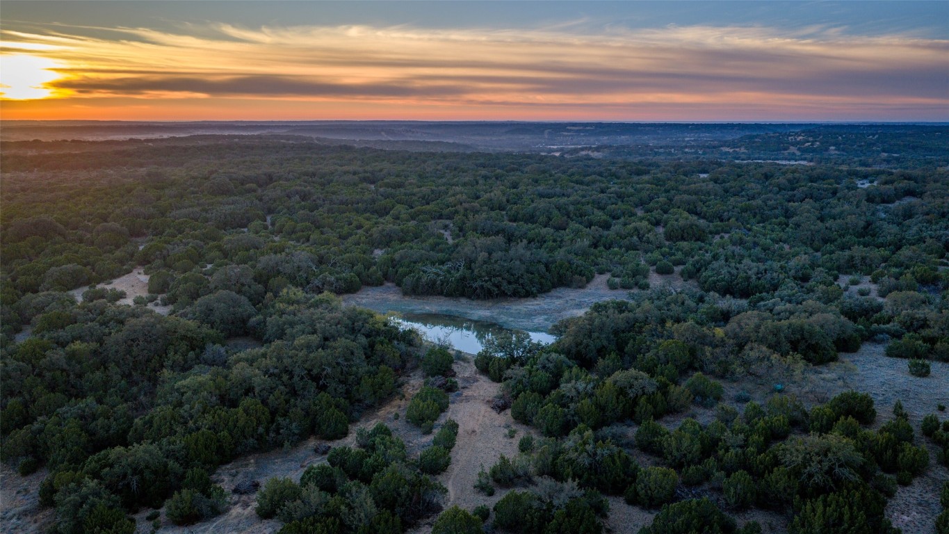 532 County Road 468 Rochelle, TX 76872 - Photo 26 of 39 Bird's eye view of a forest and a large body of water