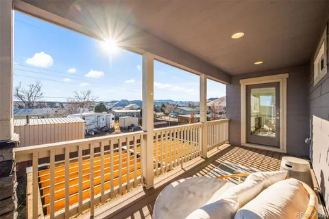 a spacious bathroom with a shower sink and mirror