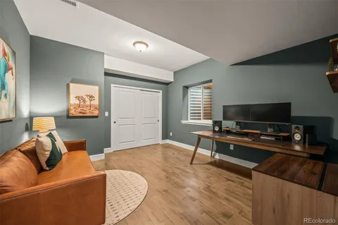 a view of backyard with a patio