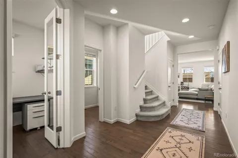a view of entryway with livingroom and stairs