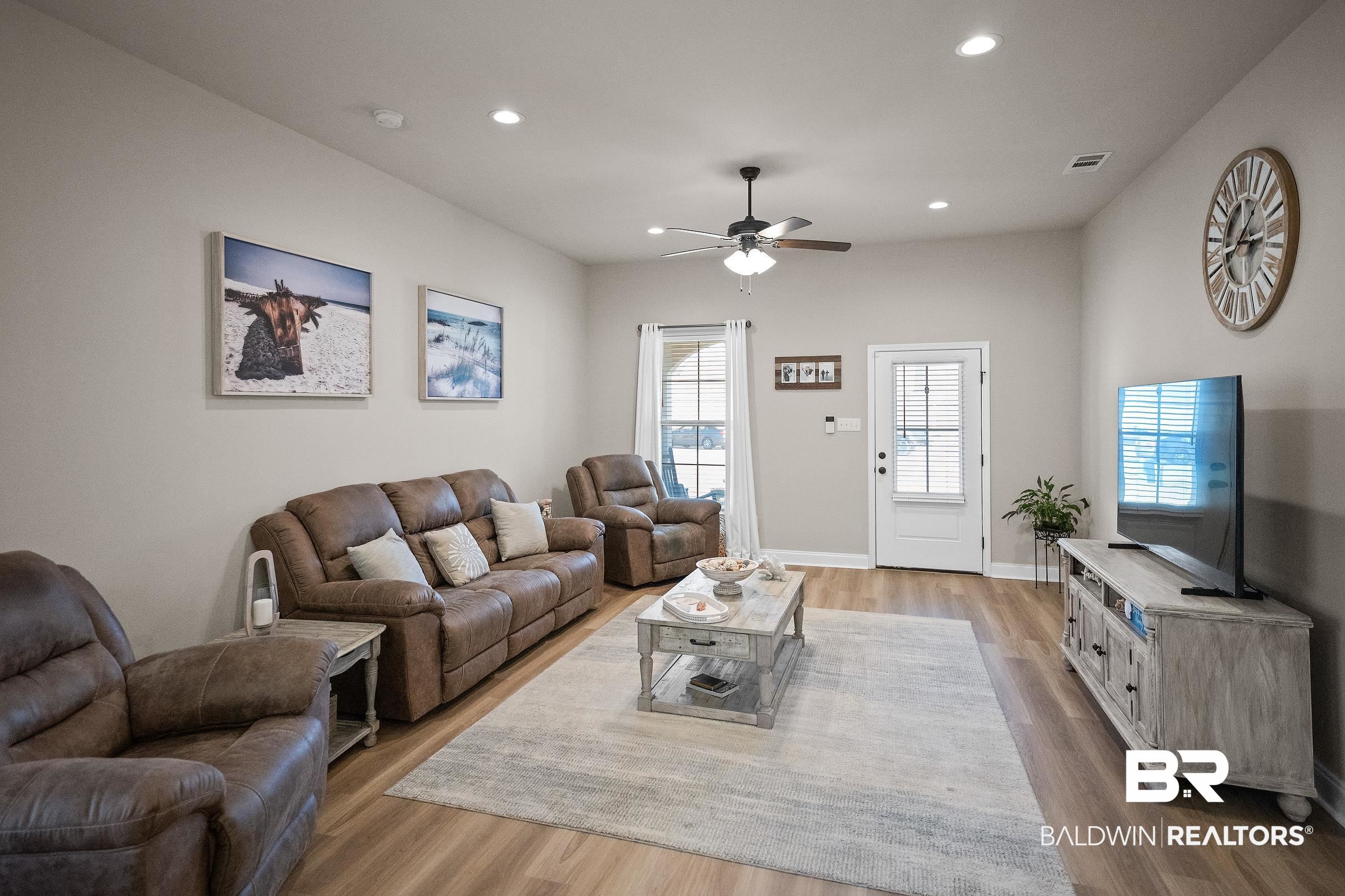 1077 Stella Road Foley, AL 36535 - Photo 9 of 27 Living room with a ceiling fan, light wood-style flooring, and recessed lighting