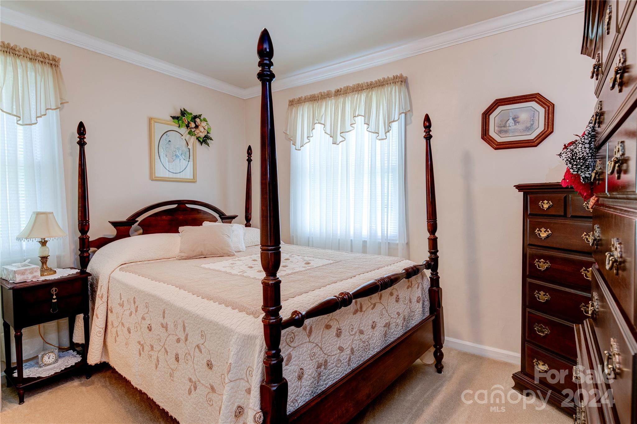 155 Arthur Road Asheville, NC 28806 - Photo 18 of 29 a bedroom with bed and a window