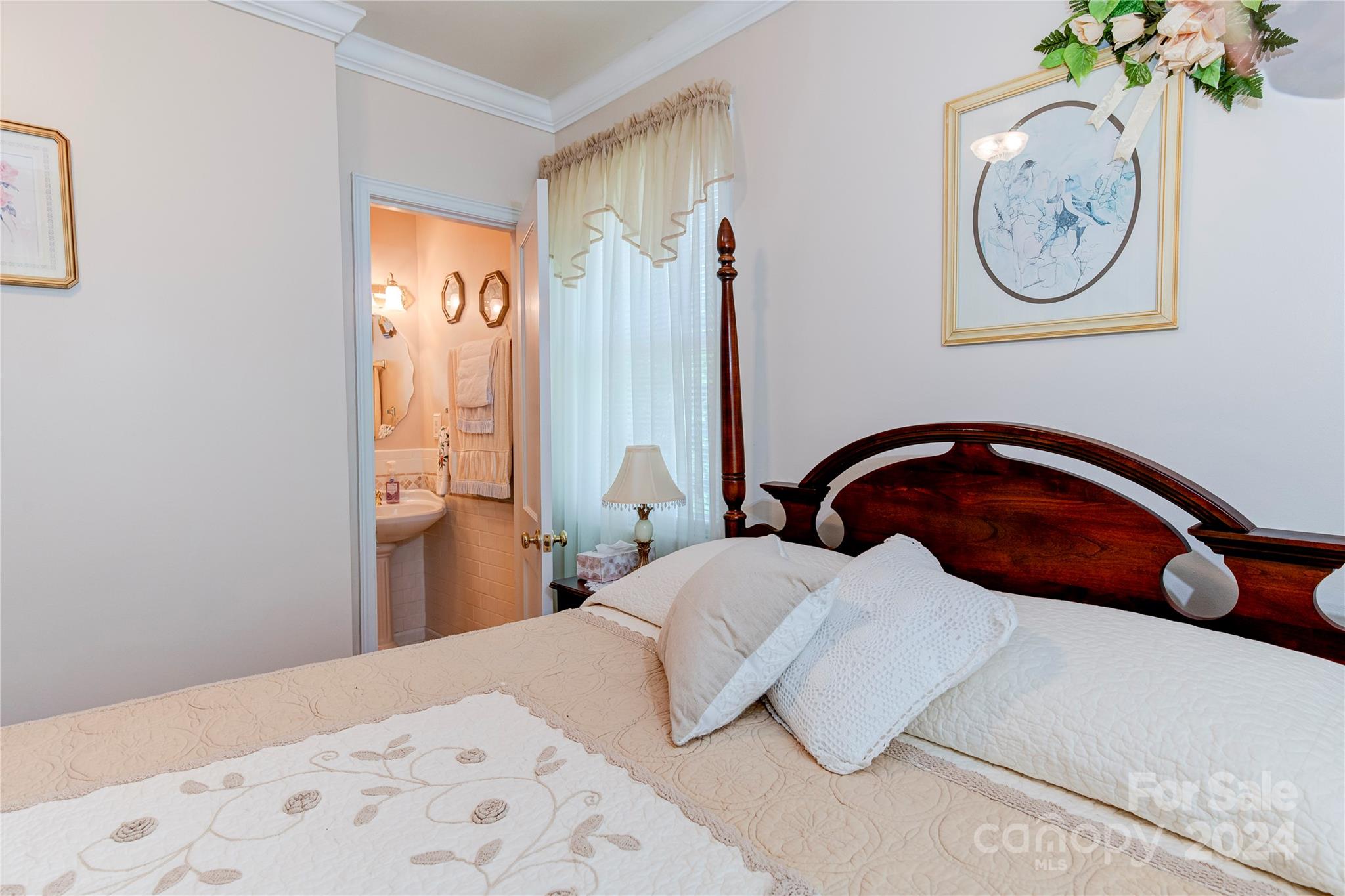 155 Arthur Road Asheville, NC 28806 - Photo 19 of 29 a bedroom with a bed and a closet