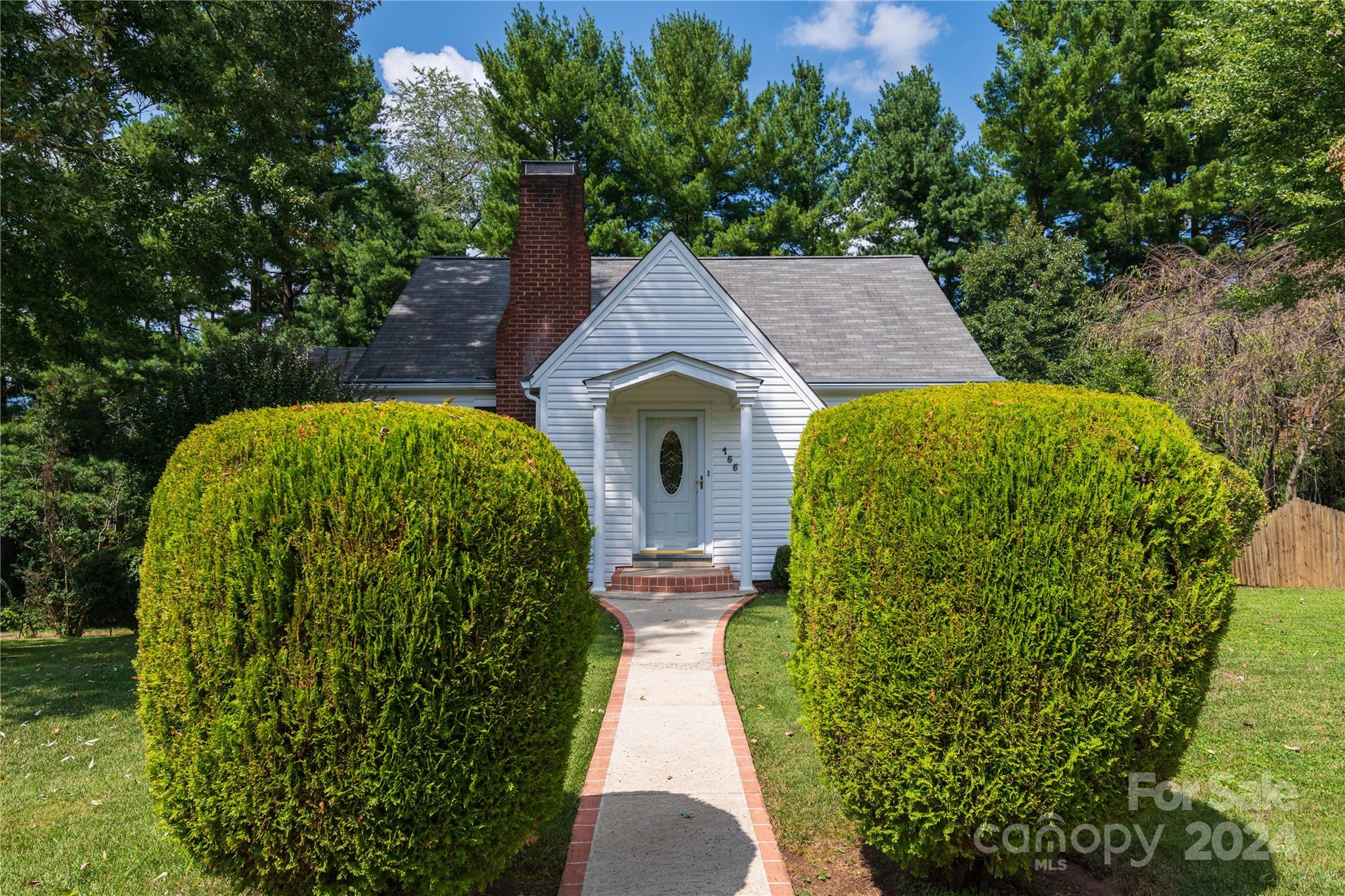 155 Arthur Road Asheville, NC 28806 - Photo 2 of 29 a view of house with garden