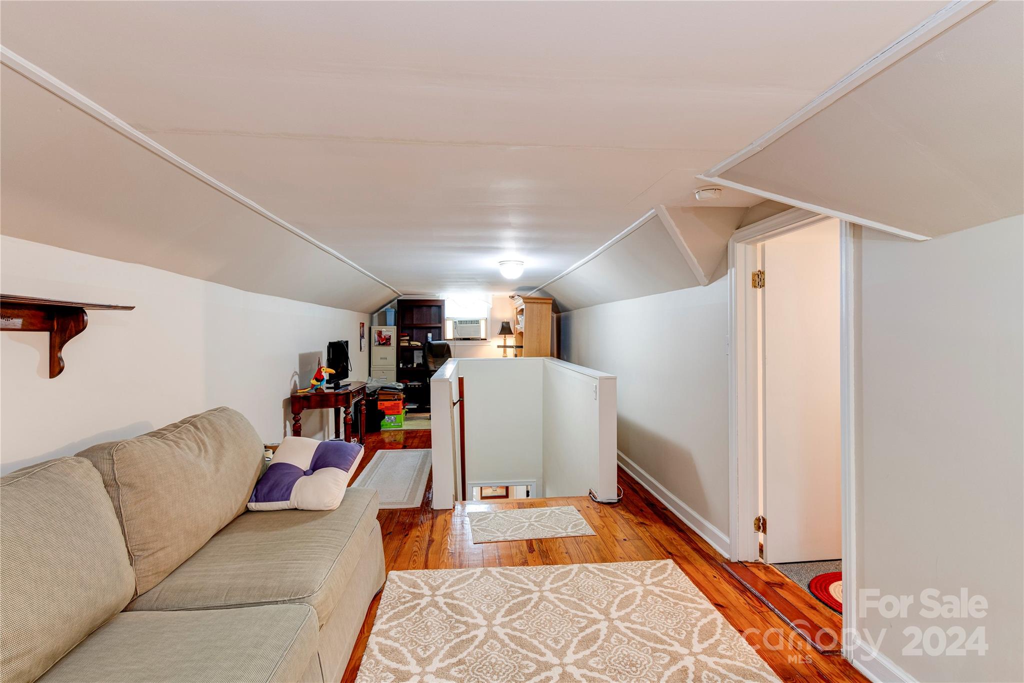 155 Arthur Road Asheville, NC 28806 - Photo 22 of 29 a living room with furniture and a couch