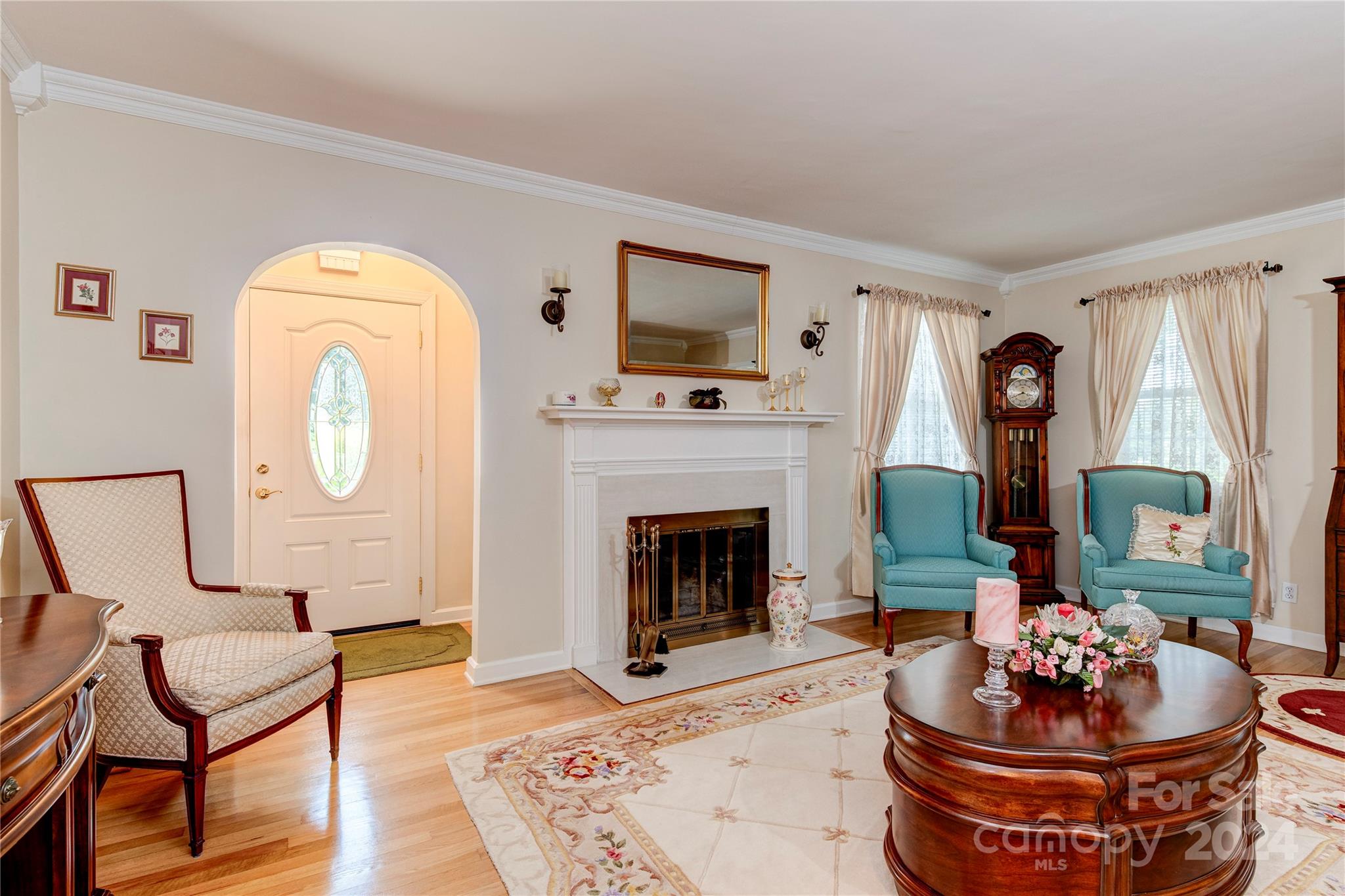 155 Arthur Road Asheville, NC 28806 - Photo 6 of 29 a living room with furniture and a fireplace