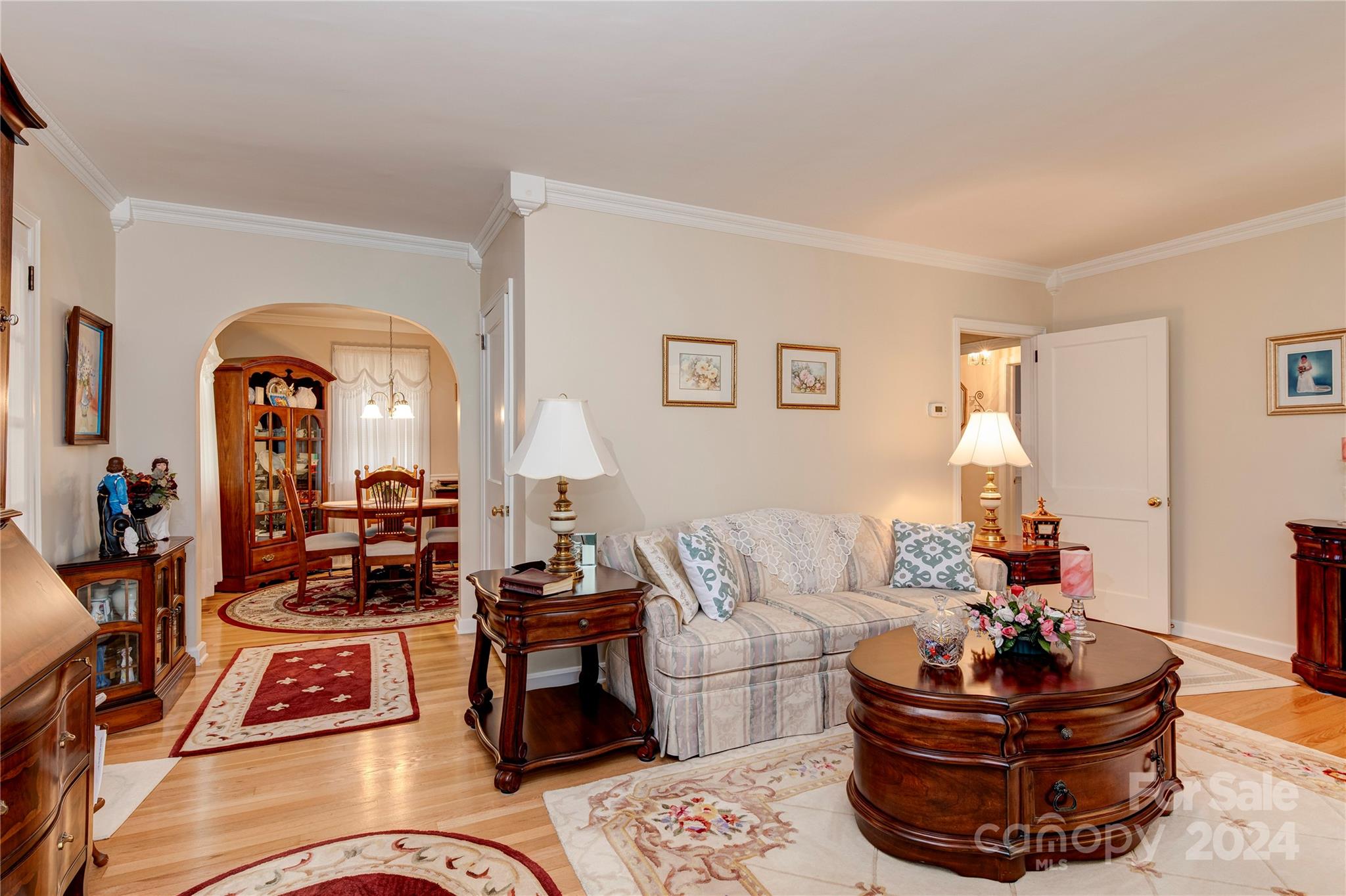 155 Arthur Road Asheville, NC 28806 - Photo 7 of 29 a living room with furniture and a lamp