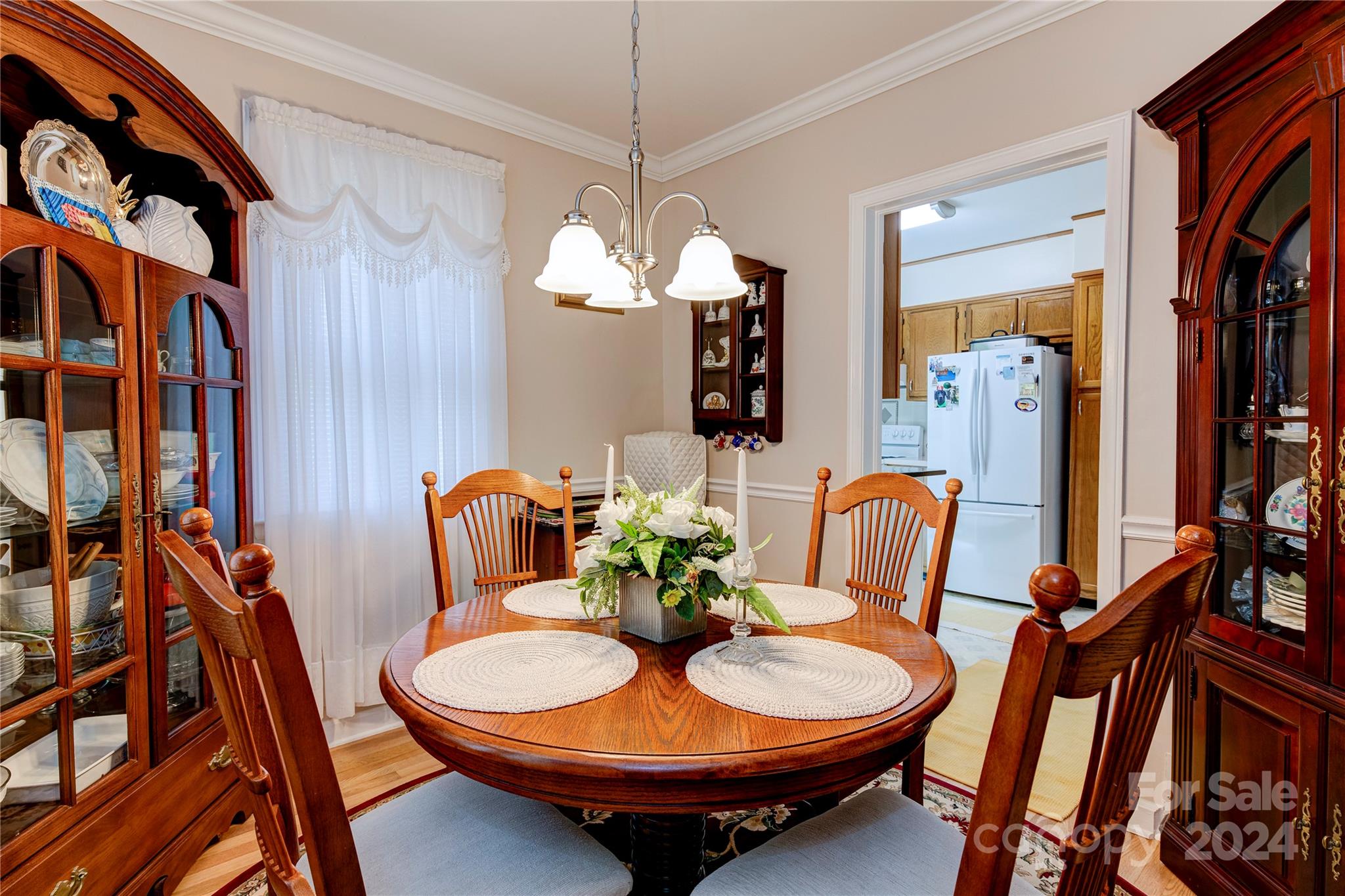 155 Arthur Road Asheville, NC 28806 - Photo 9 of 29 a dining room with furniture and wooden floor