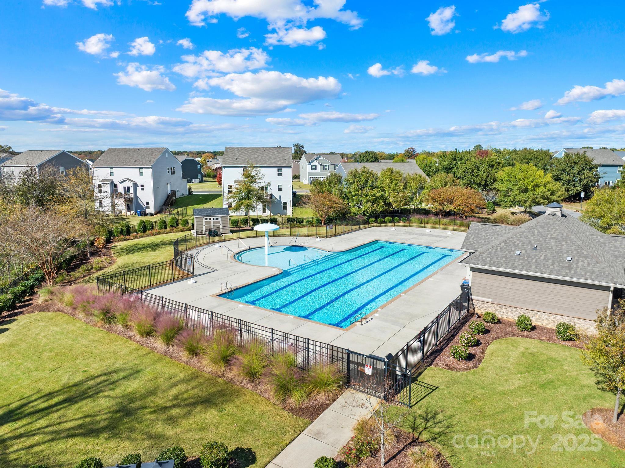 128 West Neel Ranch Road Mooresville, NC 28115 - Photo 16 of 27 a view of a swimming pool with furniture