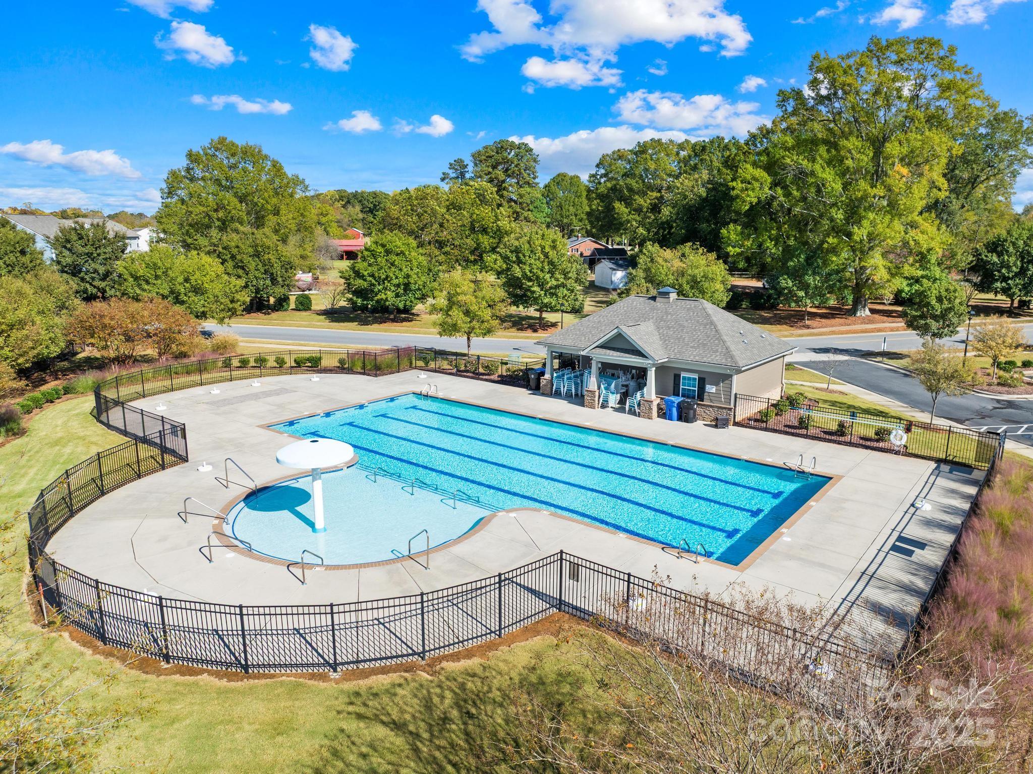 128 West Neel Ranch Road Mooresville, NC 28115 - Photo 17 of 27 a view of a house with swimming pool