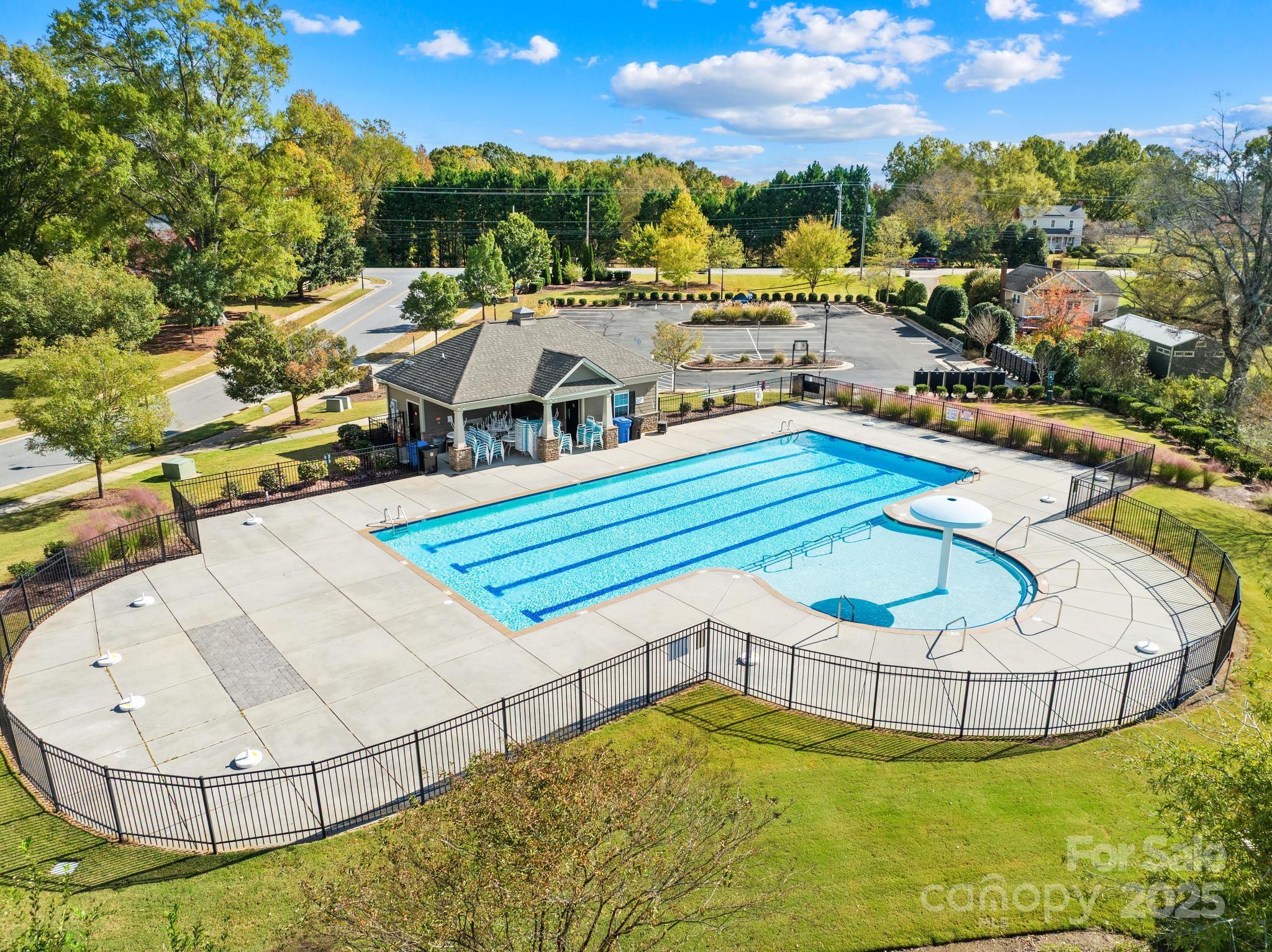 128 West Neel Ranch Road Mooresville, NC 28115 - Photo 18 of 27 a view of a swimming pool with an outdoor seating