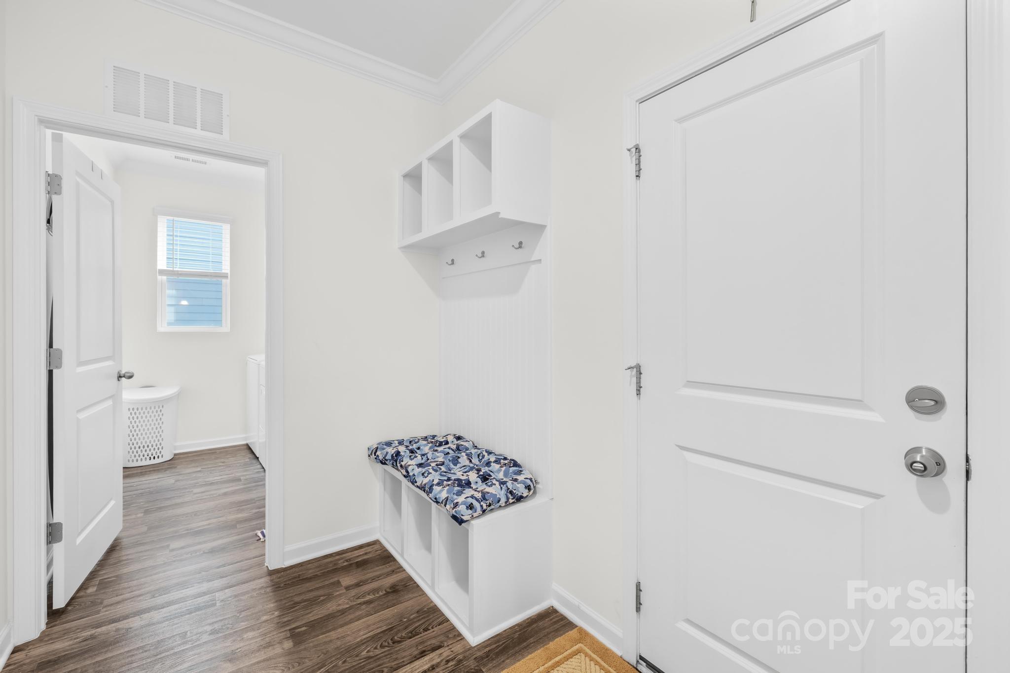 128 West Neel Ranch Road Mooresville, NC 28115 - Photo 6 of 27 a view of a hallway with wooden floor and closet