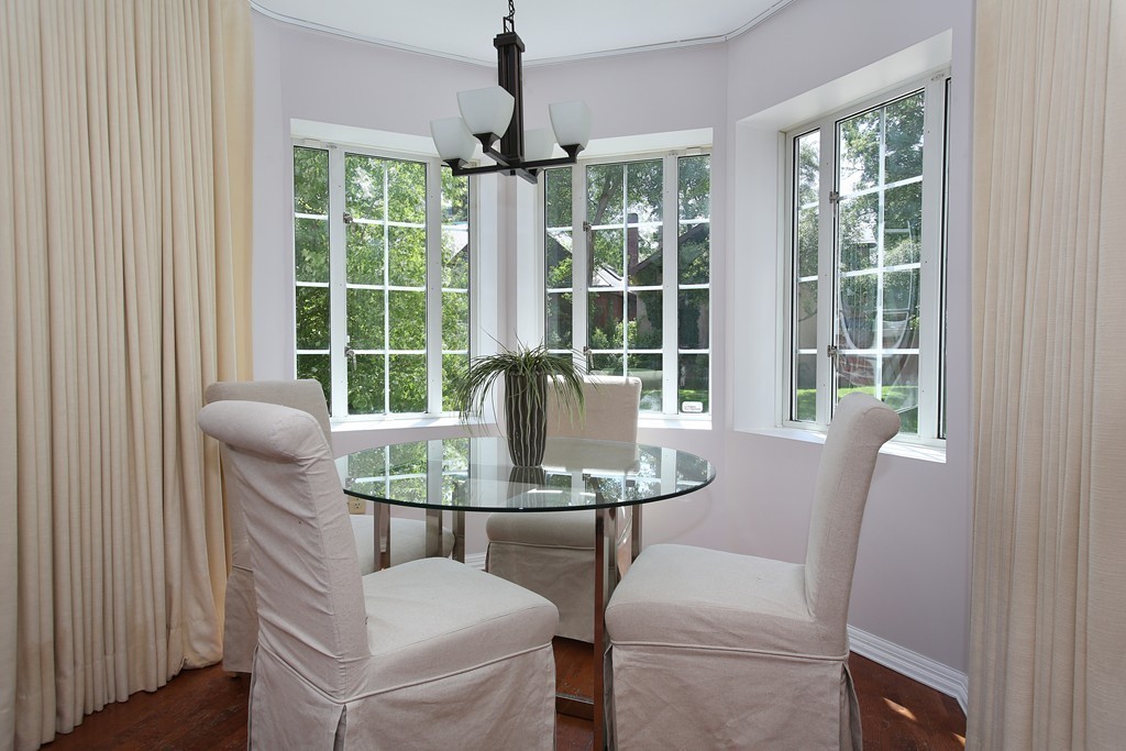 20 Chapel Street, Unit B411 Brookline, MA 02446 - Photo 3 of 18 a view of a dining room with furniture window and outside view