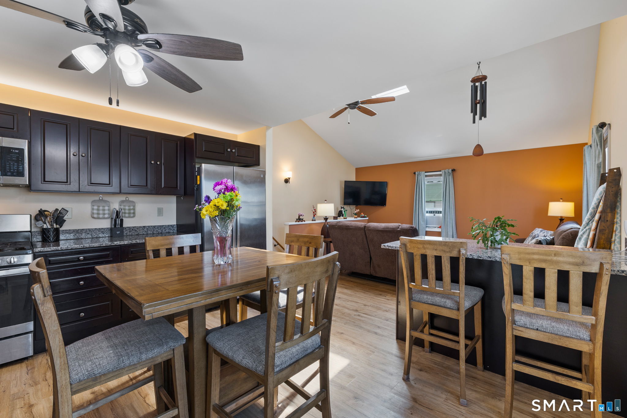 132 Howard Avenue Ansonia, CT 06401 - Photo 29 of 41 a view of a dining room with furniture window and wooden floor