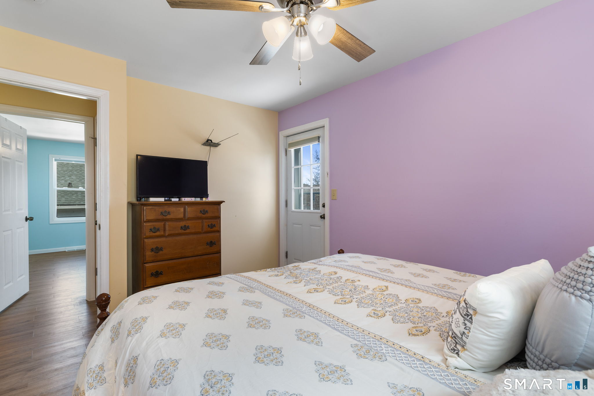 132 Howard Avenue Ansonia, CT 06401 - Photo 36 of 41 a bedroom with a bed and a flat screen tv