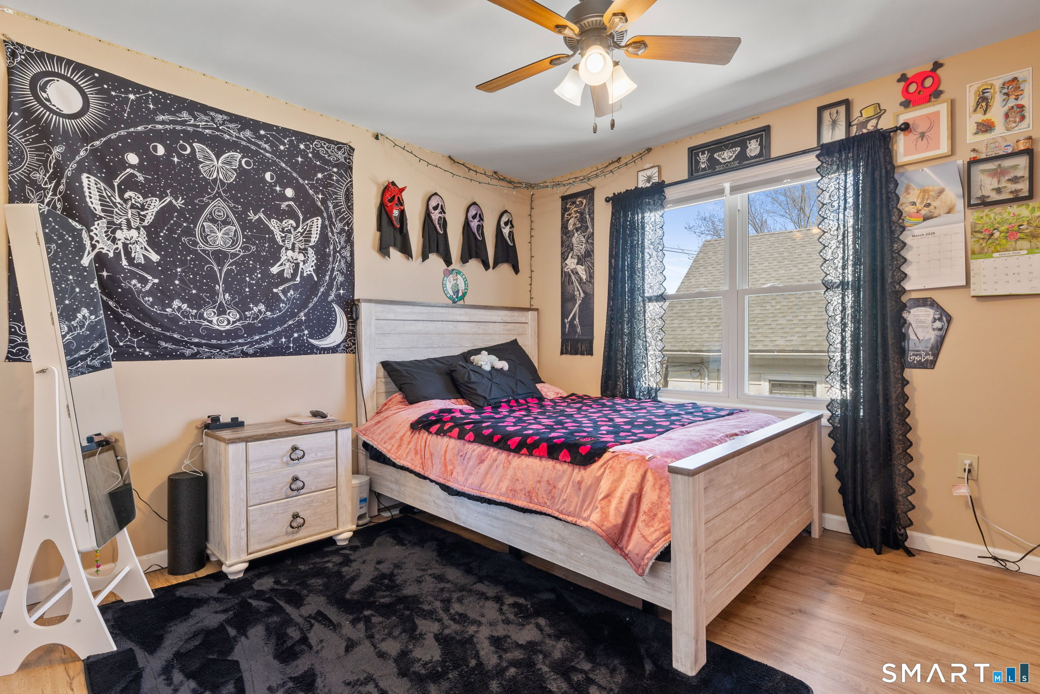 132 Howard Avenue Ansonia, CT 06401 - Photo 38 of 41 a bedroom with a bed and a window