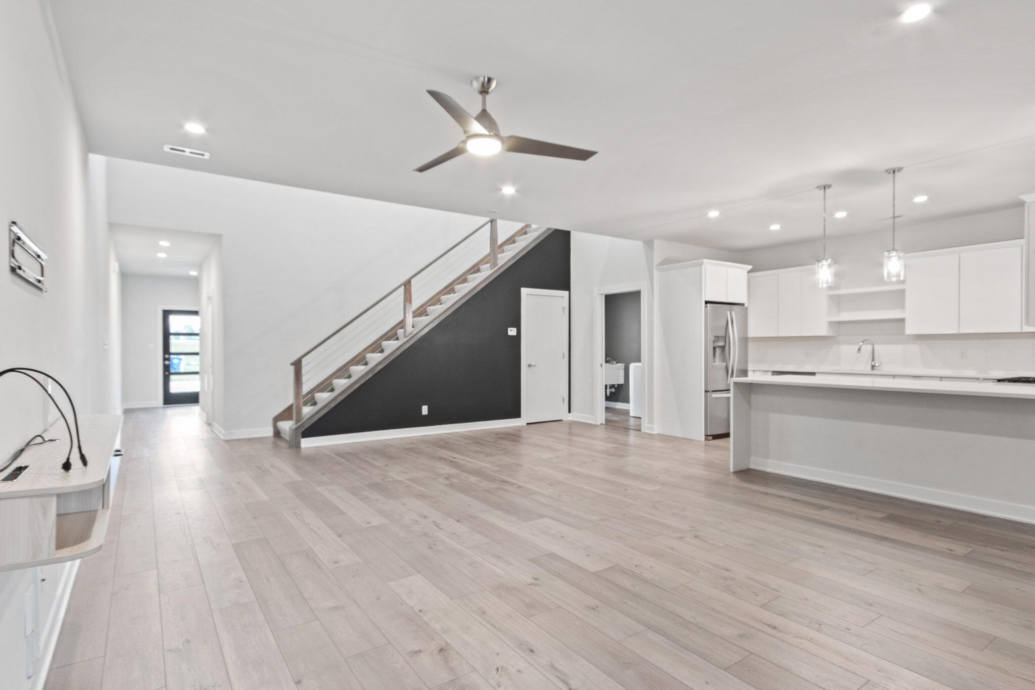 255 Nomo Place Crown Point, IN 46307 - Photo 12 of 83 a view of a kitchen with wooden floor and electronic appliances