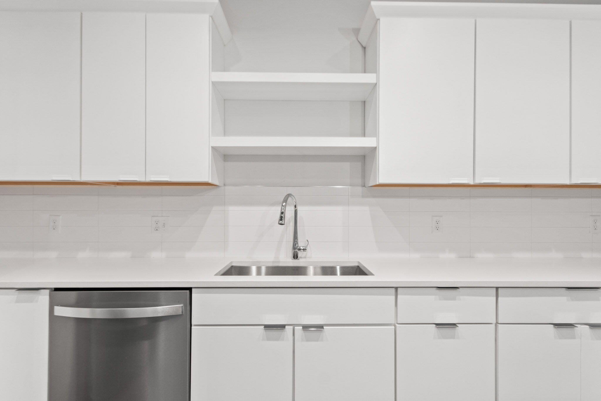 255 Nomo Place Crown Point, IN 46307 - Photo 16 of 83 a kitchen with a sink and cabinets