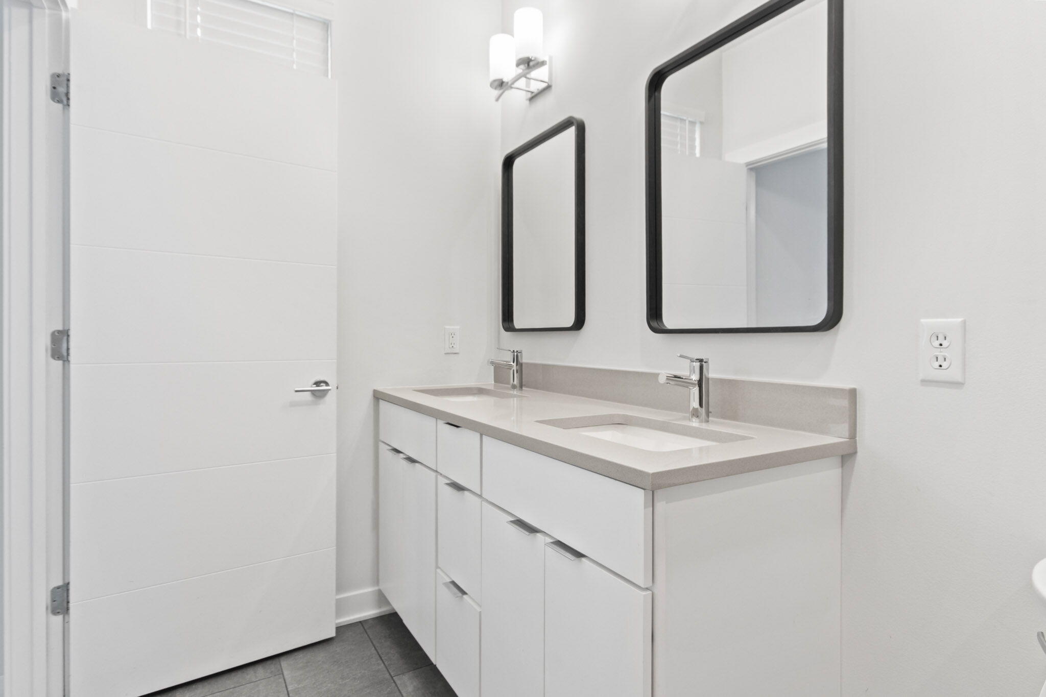 255 Nomo Place Crown Point, IN 46307 - Photo 24 of 83 a bathroom with a double vanity sink and a mirror