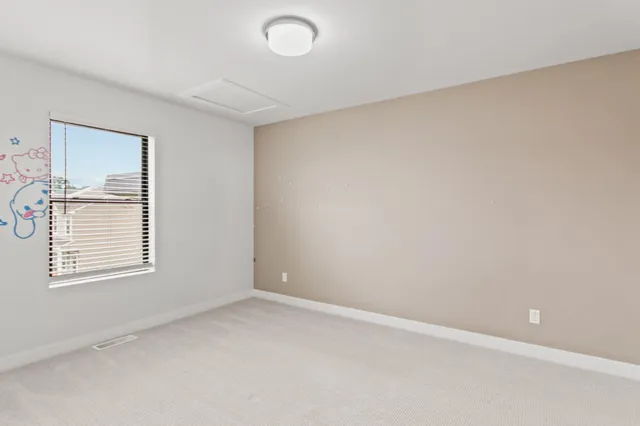 an aerial view of a residential apartment building with a yard