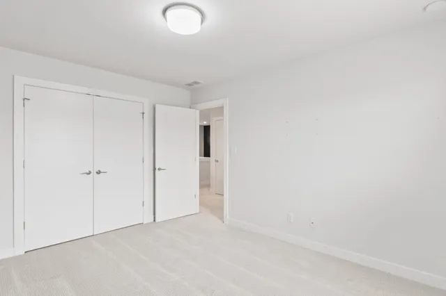 an aerial view of a house with a swimming pool yard and outdoor seating