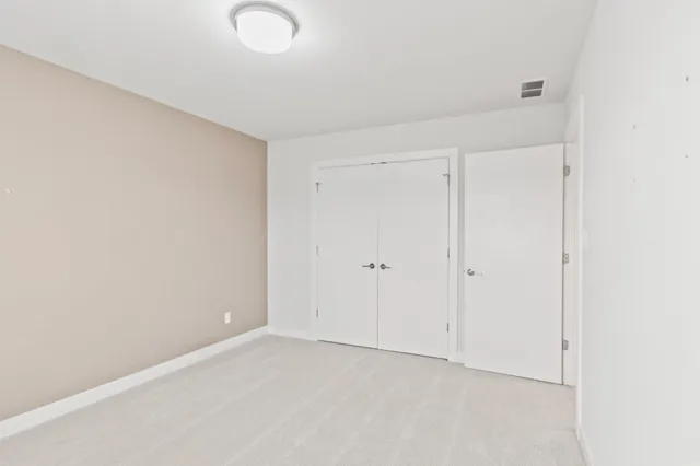 an aerial view of a house with a swimming pool yard and outdoor seating