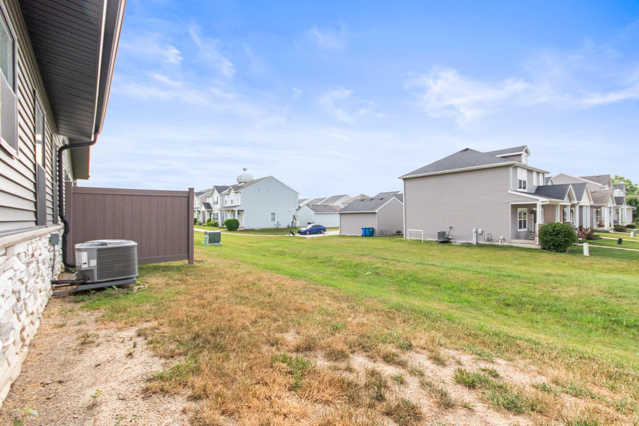 255 Nomo Place Crown Point, IN 46307 - Photo 60 of 83 a view of a house with a yard