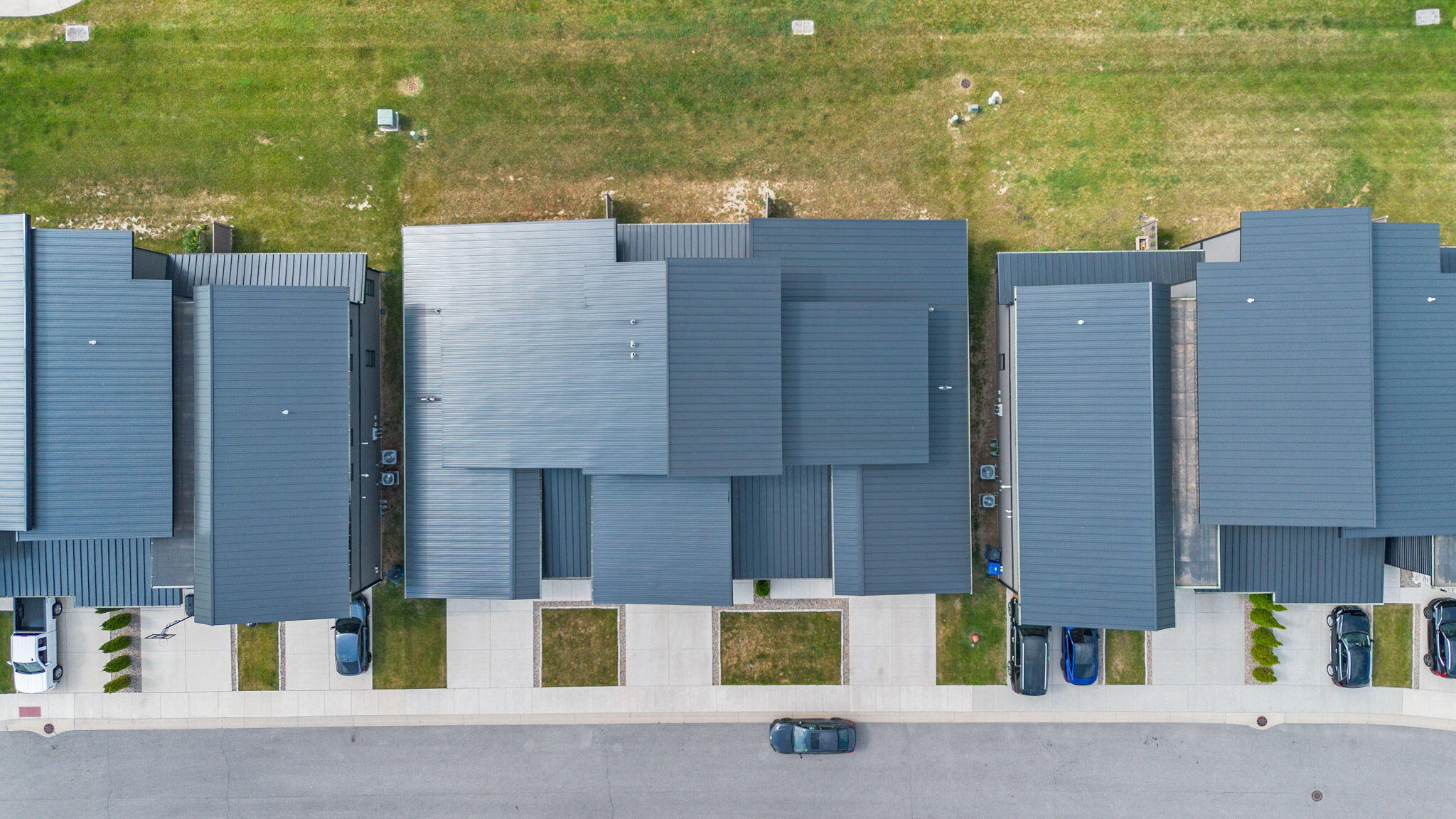 255 Nomo Place Crown Point, IN 46307 - Photo 72 of 83 an aerial view of residential houses with outdoor space and ocean view