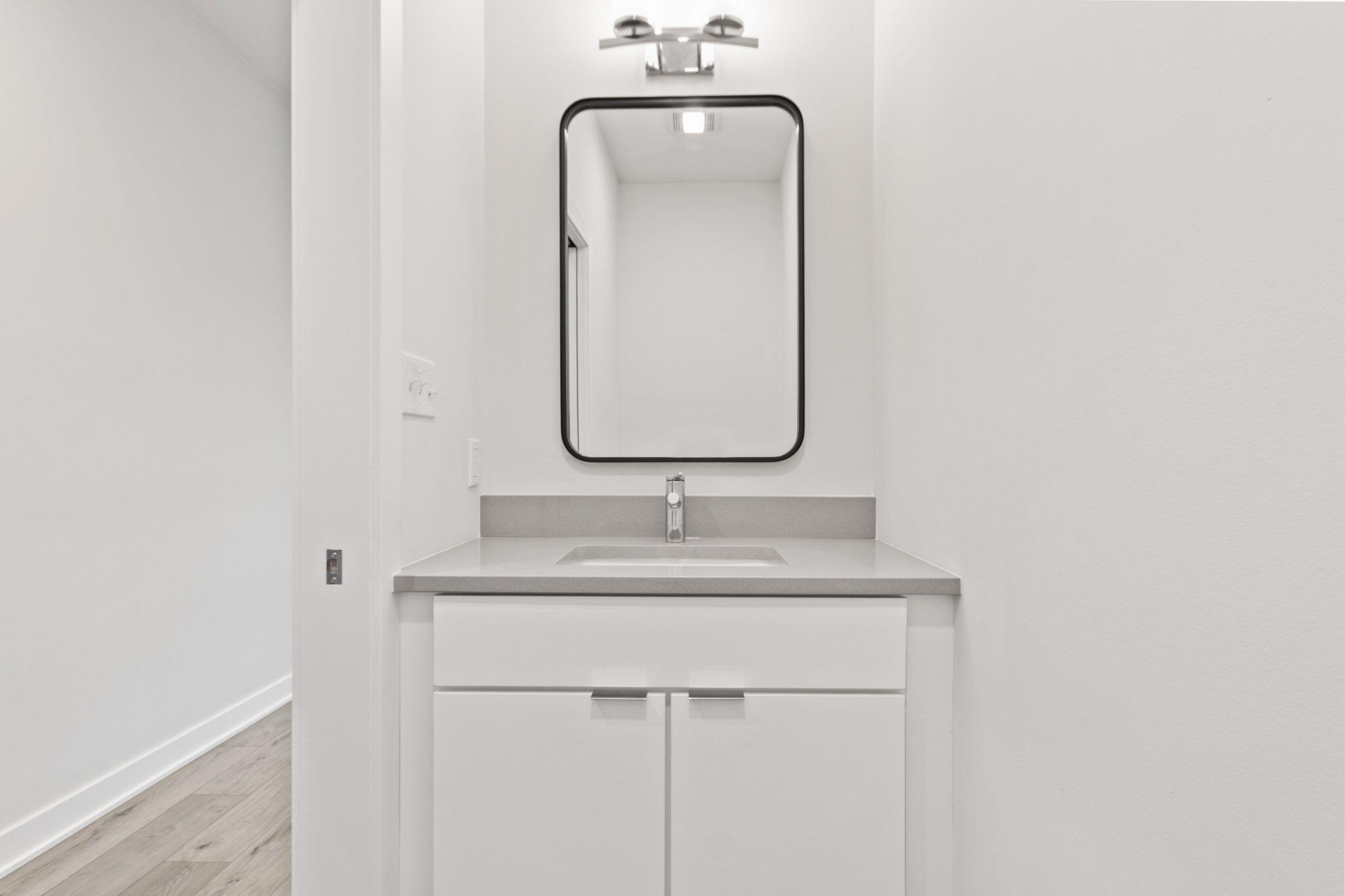 255 Nomo Place Crown Point, IN 46307 - Photo 10 of 83 a bathroom with a sink and a mirror